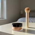 Jar on a vanity table with a brush