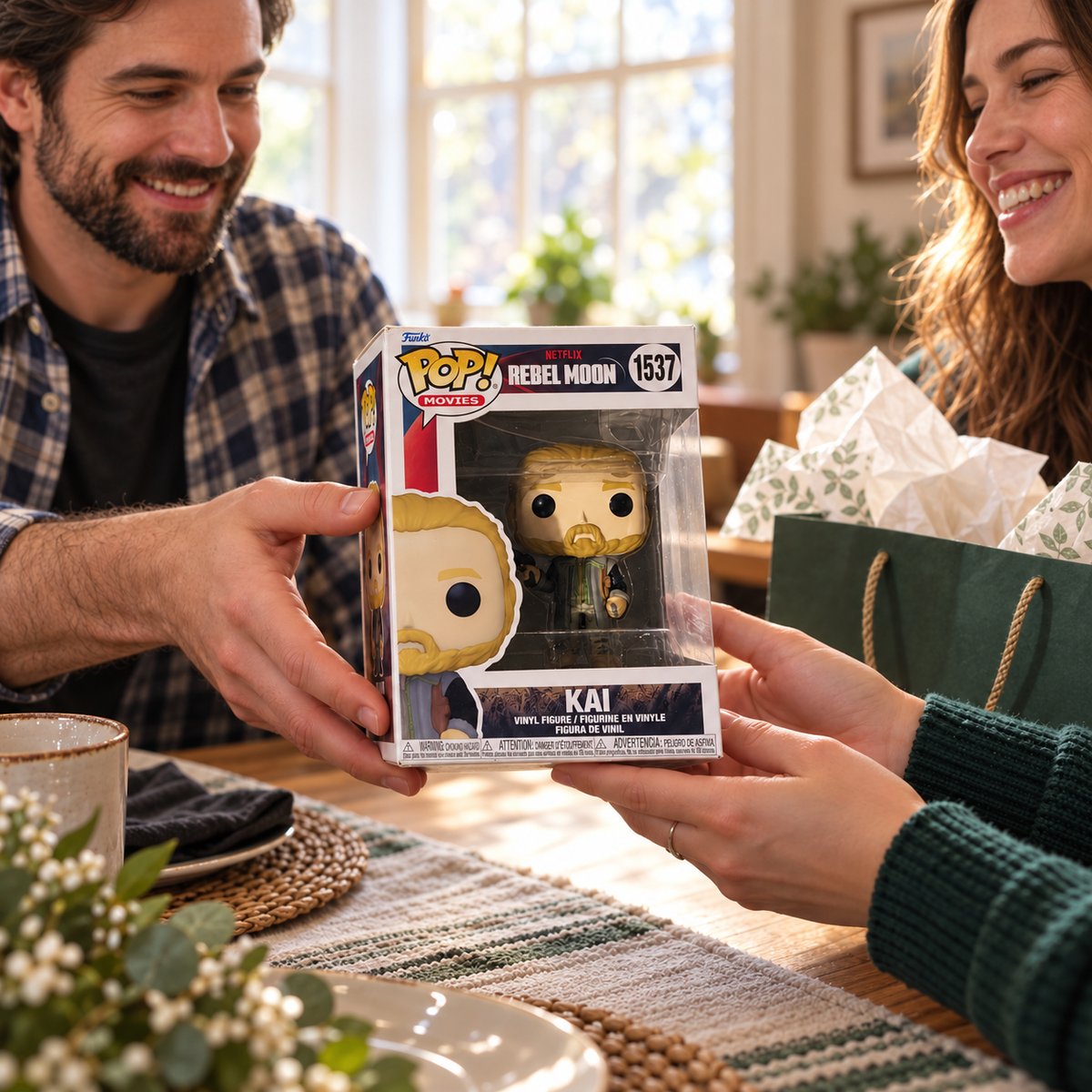 Boxed Funko Pop! Kai #1537 being exchanged as a gift.