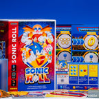 Product image for KESS Sonic Roll board game showing the box, player board, and game components.