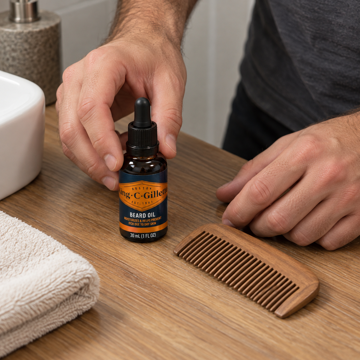 Setting orange-label King C. Gillette Beard Oil beside a wooden beard comb