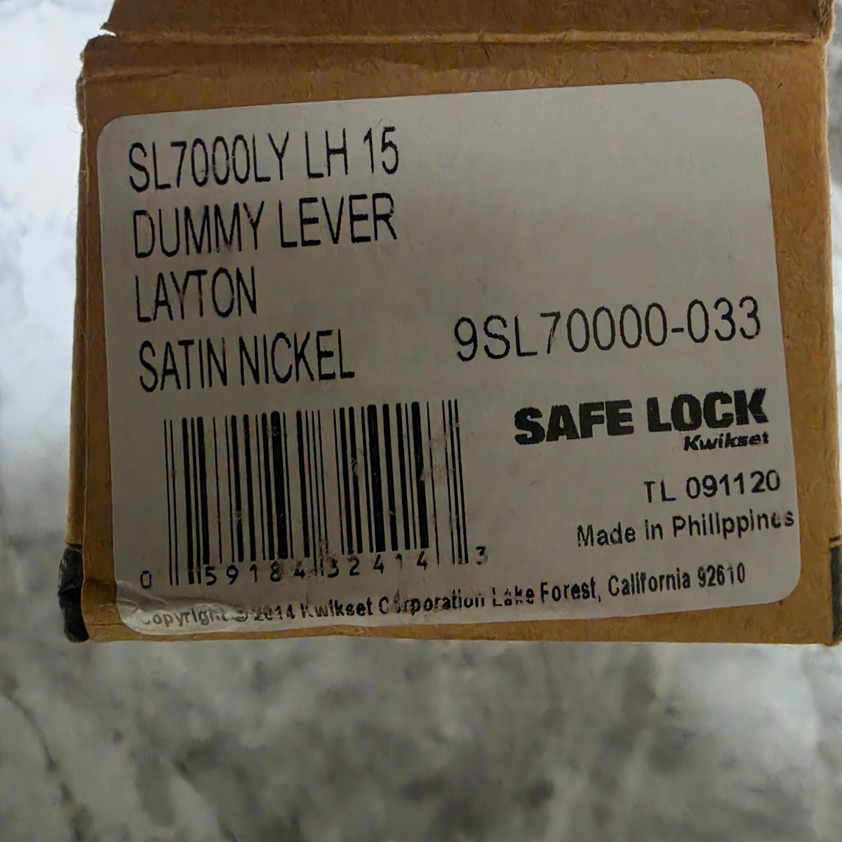 Actual Kwikset Safe Lock Layton box label showing SL7000LY LH 15, satin nickel and UPC 059184324143