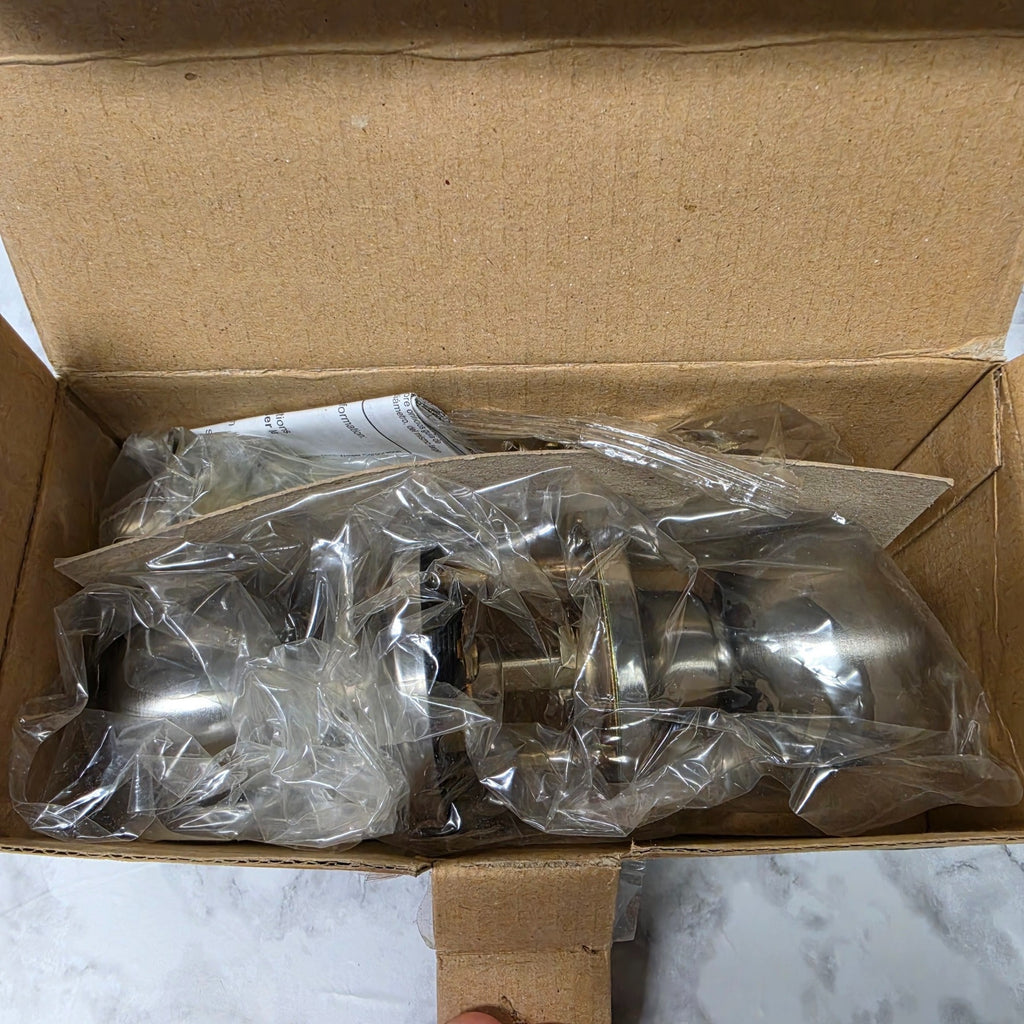 Actual Safe Lock by Kwikset Regina Satin Nickel privacy knob hardware in its open original box