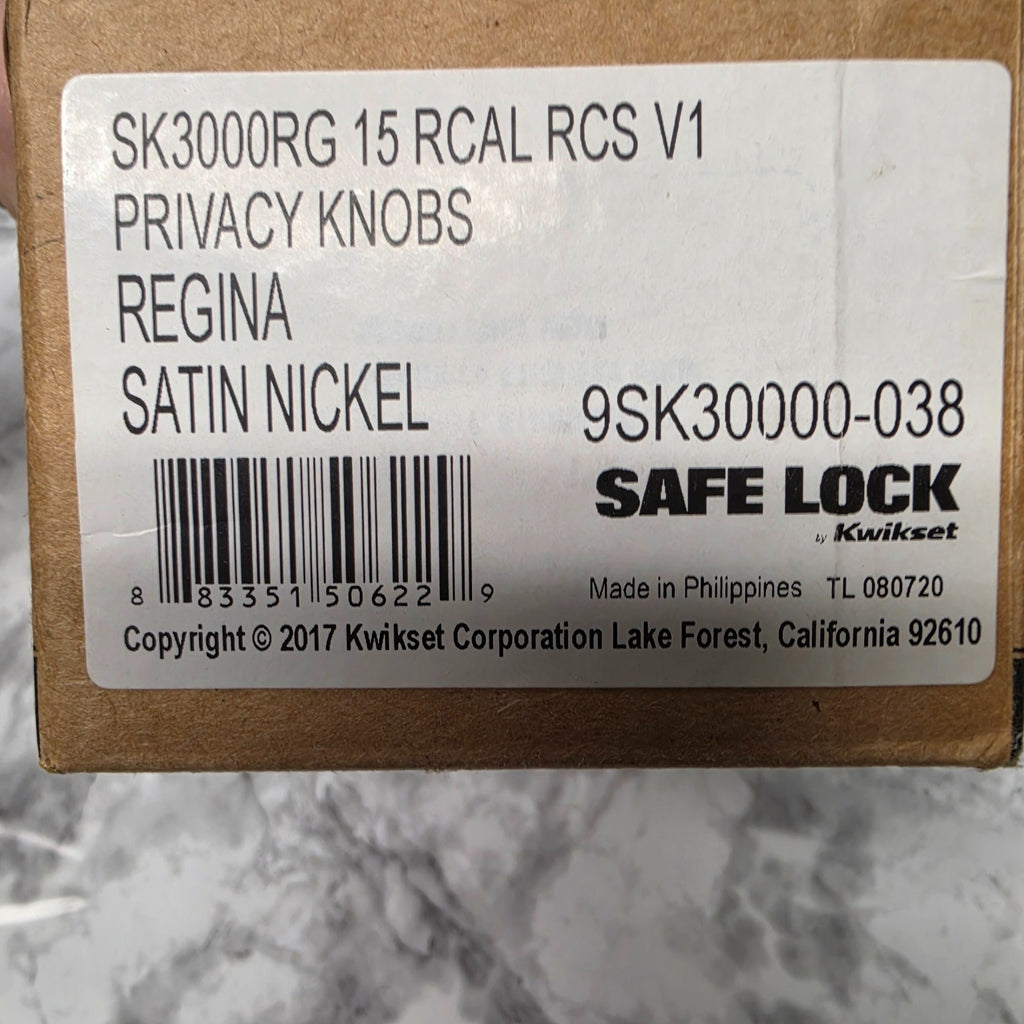Actual Regina privacy knob box label showing Satin Nickel, 9SK30000-038 and UPC 883351506229