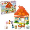 Product image of LEGO DUPLO Bluey's Family House with Memory Game 10459 showing the retail box, house build, figures, and accessories.