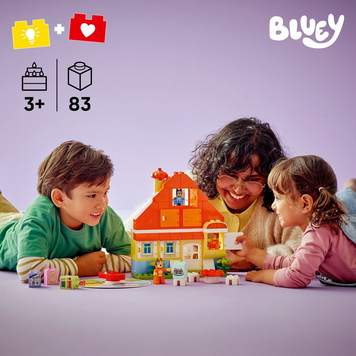 Lifestyle product image for LEGO DUPLO Bluey's Family House with Memory Game 10459 showing children playing with the house set.