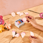 Customizing a Lifelines FlowCrafts paper flower petal with the included petal paint