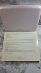 Original photo of the closed pink Mary Kay Color Palette 5928 and box with refill capacity instructions