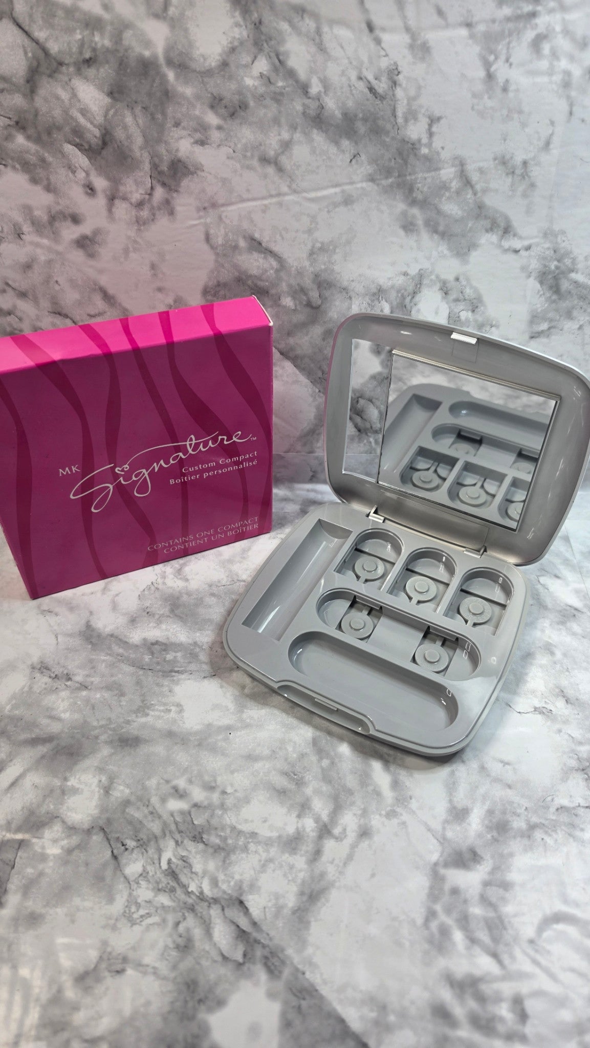 Mary Kay MK Signature Custom Compact 9004 actual open interior showing mirror, shaped refill recesses and accessory spaces