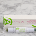 AI-generated contextual image of Mary Kay at Play Shadow & Liner in Mint to Be with box and dual-ended crayon.