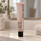 Mary Kay Beige 2 tinted moisturizer tube on a stone shelf