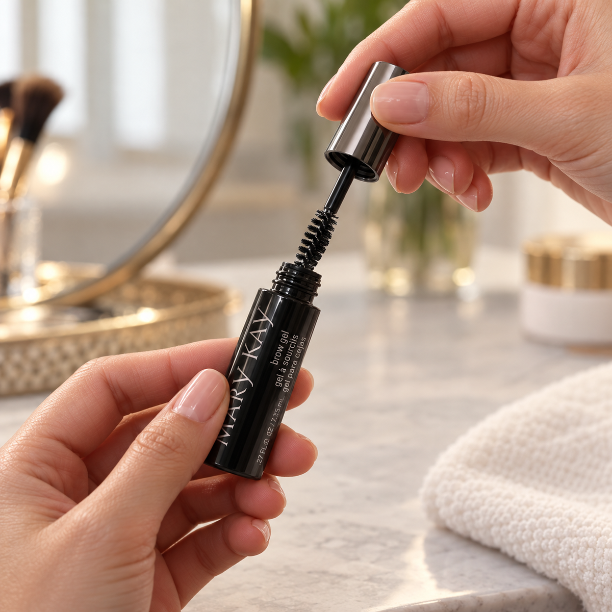 Returning the brush to the Mary Kay Clear Brow Gel tube