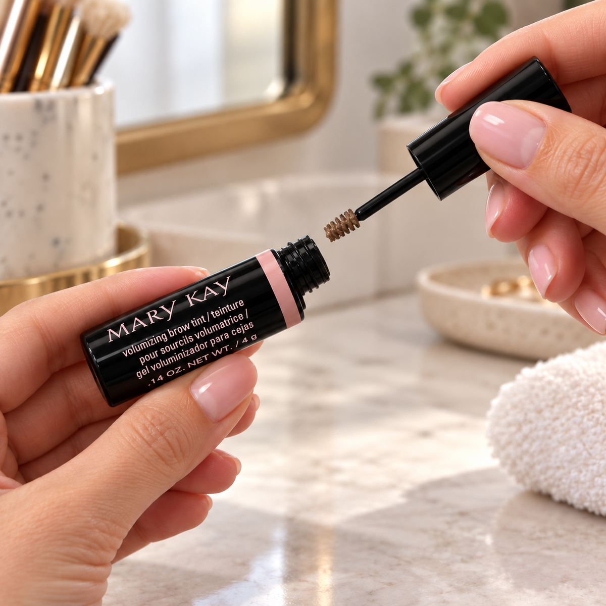 Withdrawing the small brush from the Mary Kay Brow Tint tube