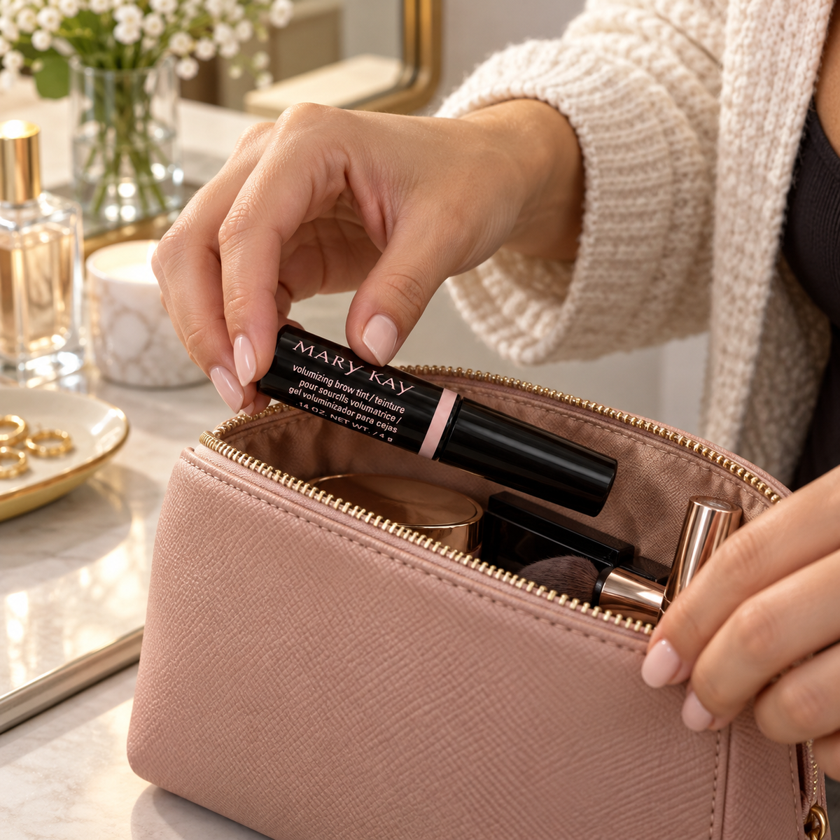 Packing Mary Kay Dark Blonde Brow Tint in a makeup bag