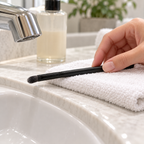 Laying a black-ferrule Eye Smudger Brush flat on a towel to dry