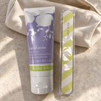Mary Kay Into the Garden Foot Scrub 3 oz with free nail file beside toiletries