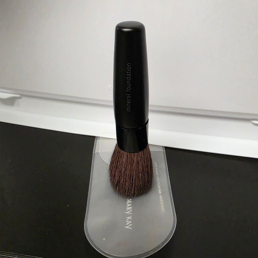 Actual stocked Mary Kay Mineral Foundation Brush in a protective clear pouch