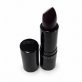 Mary Kay Puro Mirtillo matte lipstick and cap on a white background