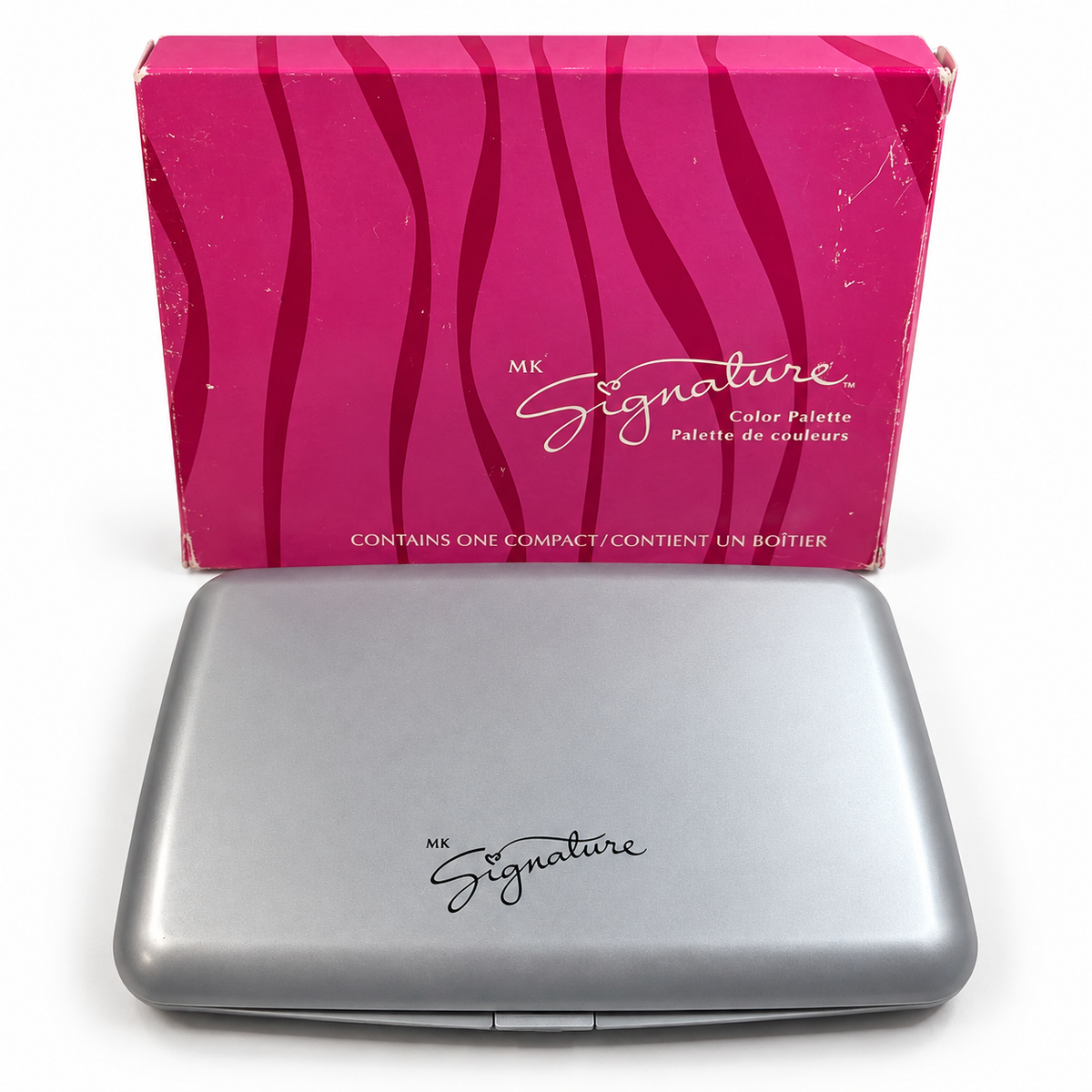 Closed silver-gray Mary Kay MK Signature Color Palette 9071 with original pink box; empty palette case