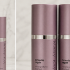 AI-generated contextual close-up of Mary Kay TimeWise Repair Revealing Radiance Facial Peel 1.7 oz bottles.