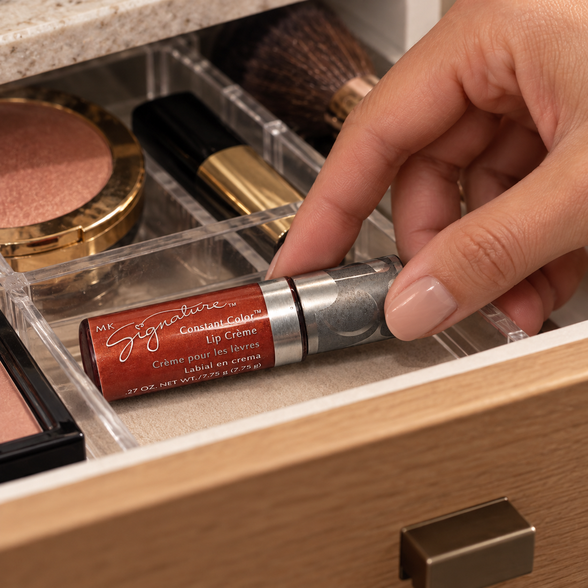 Storing Mary Kay Tropical Spice Lip Creme in a makeup drawer