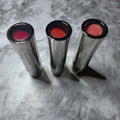 Actual Mary Kay True Dimensions Lipstick inventory in Firecracker, Arctic Apricot, and Tangerine Pop
