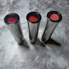 Actual Mary Kay True Dimensions Lipstick inventory in Firecracker, Arctic Apricot, and Tangerine Pop