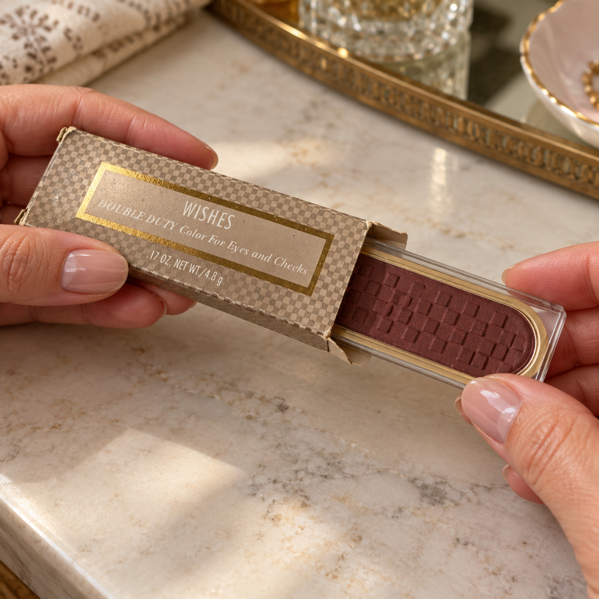 Sliding the Mary Kay Wishes powder back into its box