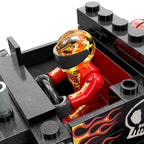 Close-up of the included red driver seated in the Bone Shaker truck