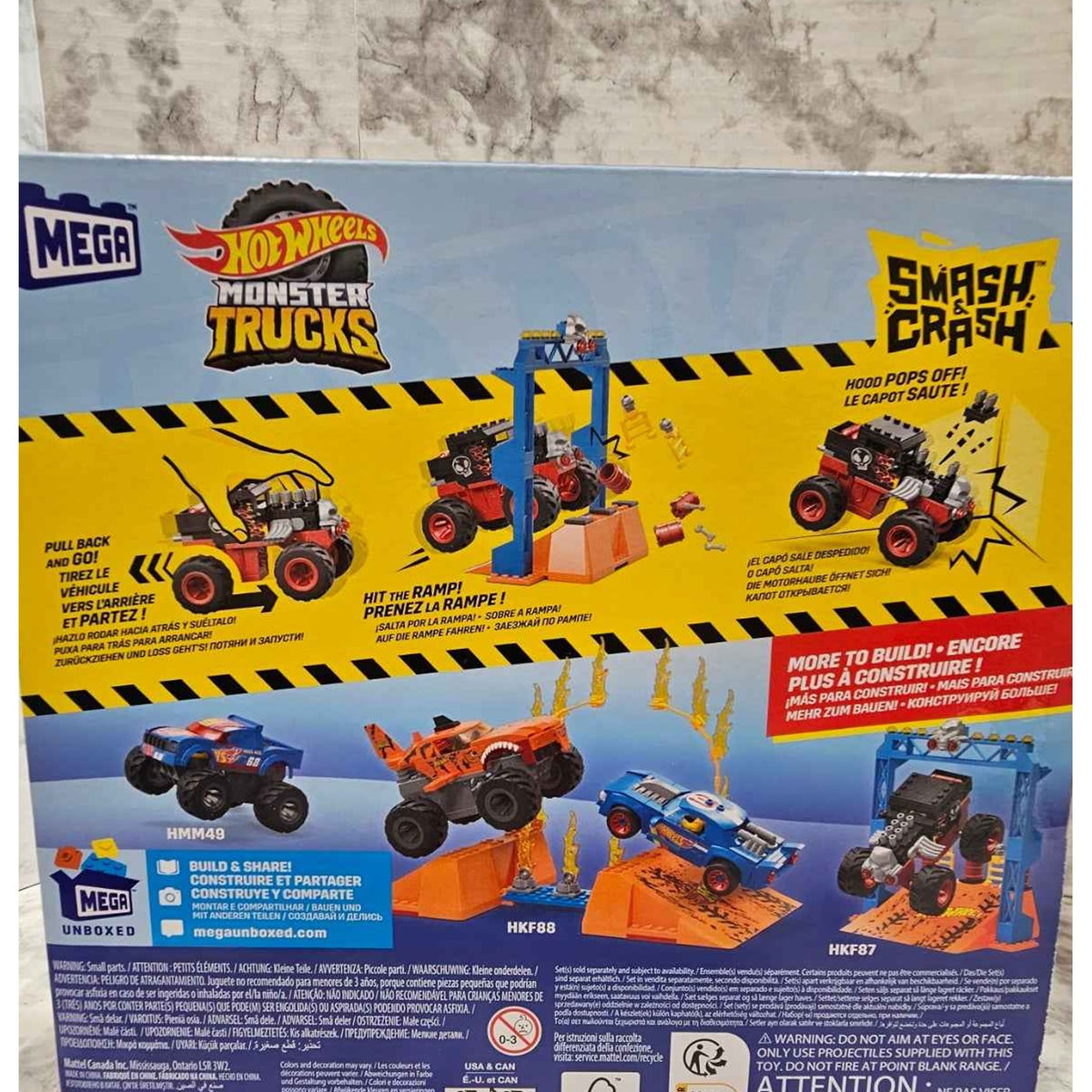 Actual photo detail of MEGA Hot Wheels Bone Shaker Crush Course side panel and product information