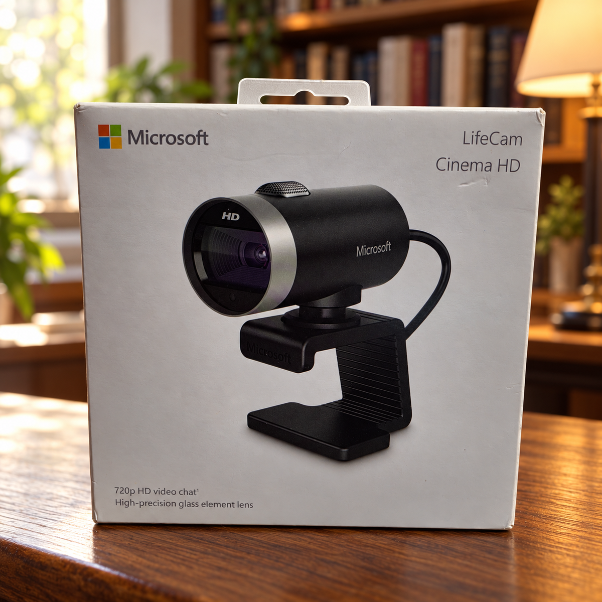 Microsoft LifeCam Cinema retail box staged in a study