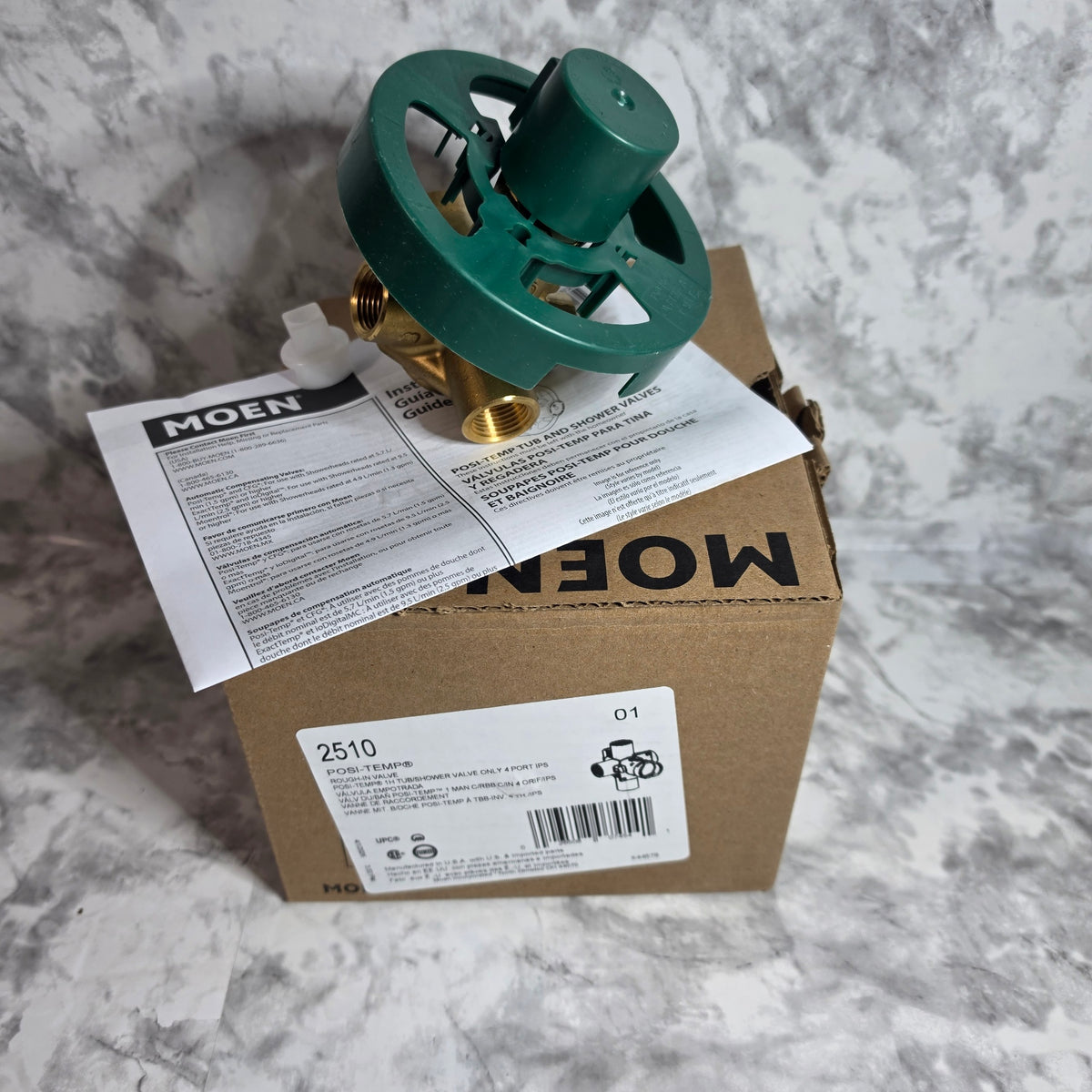 Actual stocked Moen 2510 Posi-Temp 1/2 inch IPS four-port rough-in valve with original box and instructions