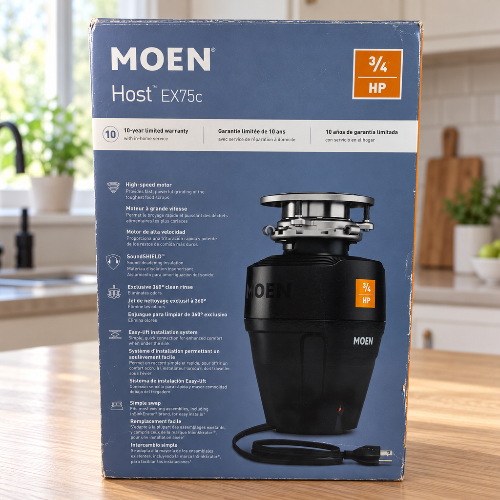 Moen Host EX75c 3/4 HP retail carton in a daylight renovation planning setting; package illustration shows the black corded disposal.