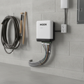 AI-generated lifestyle context of the Moen WICNT008G1USA controller with neatly organized irrigation wiring in an indoor utility area.