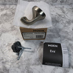 Actual stocked Moen Eva YB2803BN brushed nickel single robe hook with mounting hardware, box, and instruction booklet.