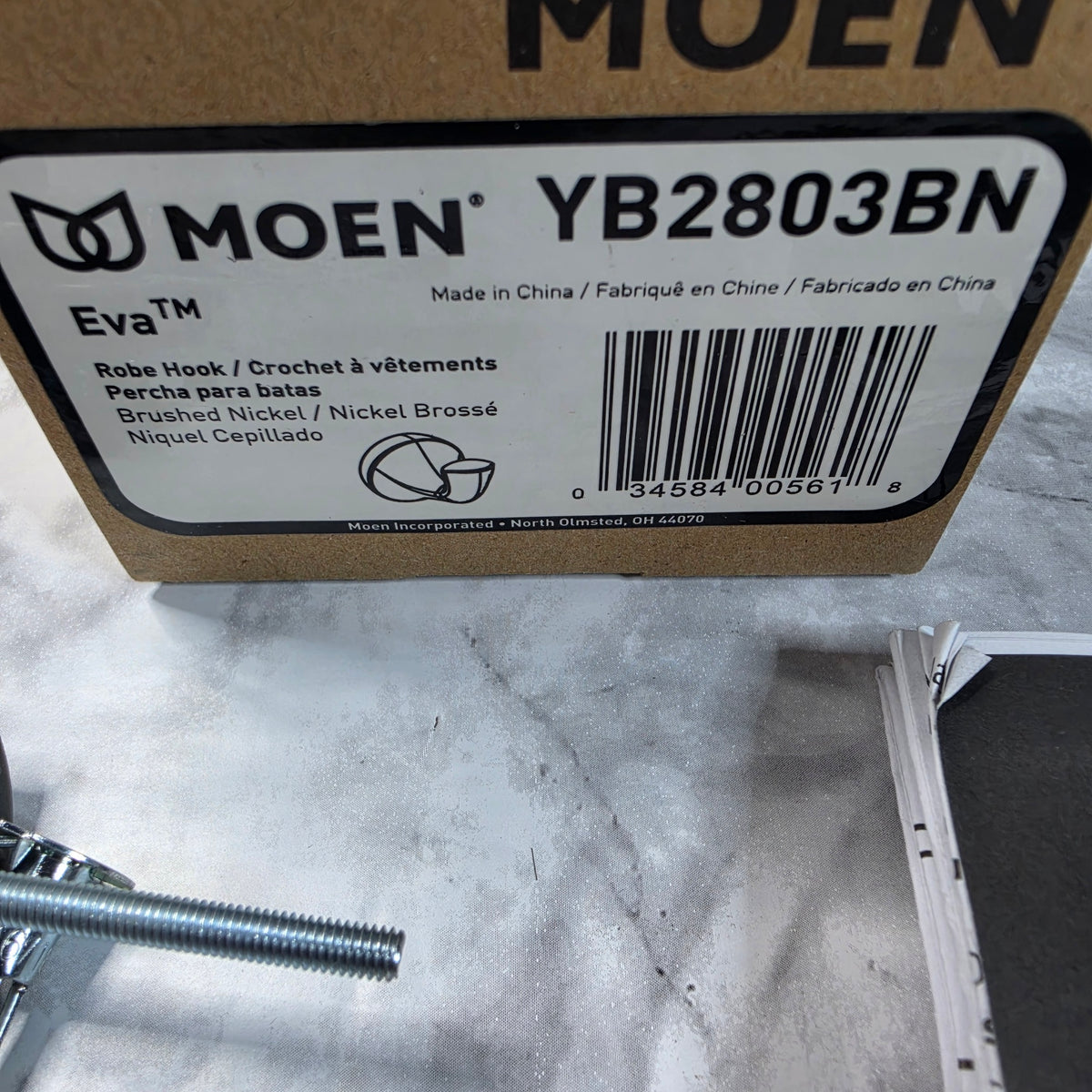 Actual Moen Eva YB2803BN package label showing the brushed nickel finish, model number, UPC, and country of origin.