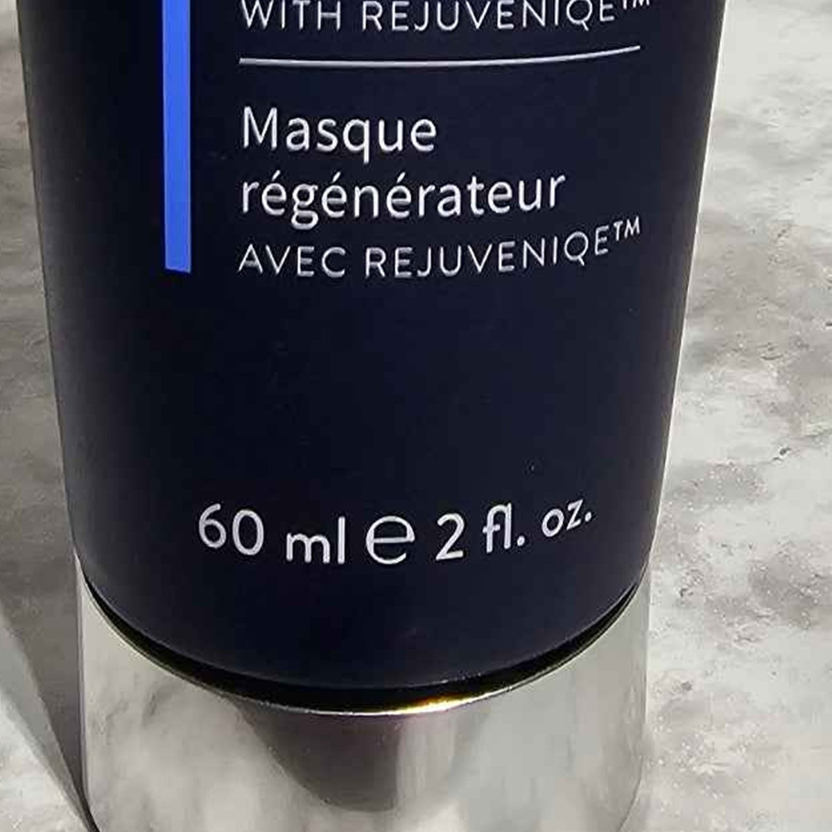 Actual photo detail of MONAT Replenish Masque 2 fl oz size marking