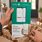 AI-generated illustration of adult hands lifting a closed Quirky + GE Tripper two-pack carton from shipping paper.