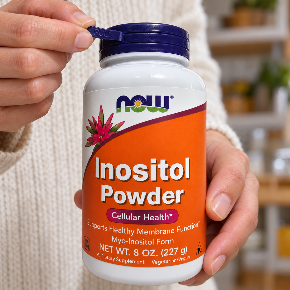 Removing the outer seal from a NOW Inositol Powder bottle