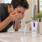 Adult cleansing at a sink with ZO Medical Oilacleanse 60 mL