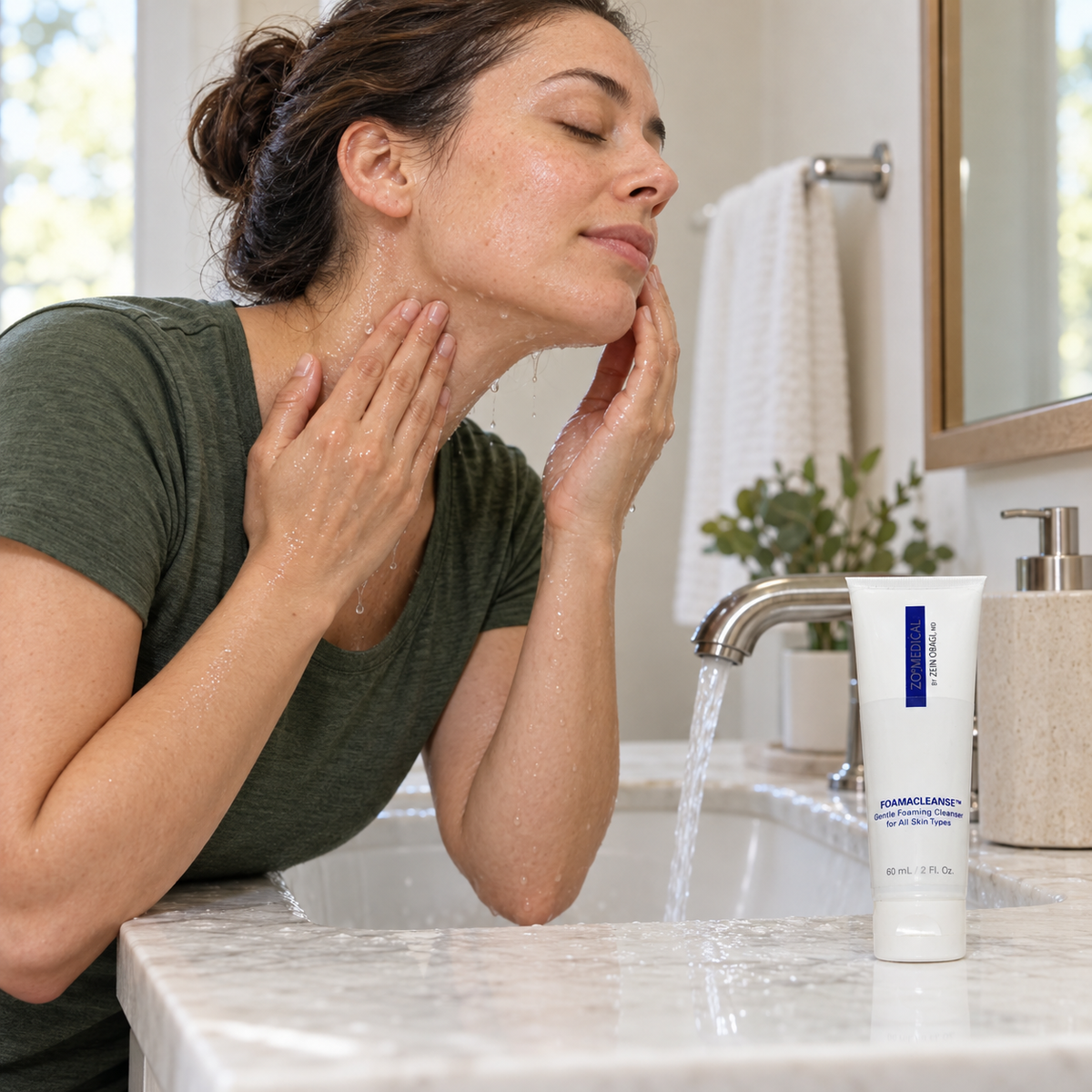 AI-staged scene: Adult cleansing at a sink with ZO Medical Foamacleanse 60 mL; props not included.