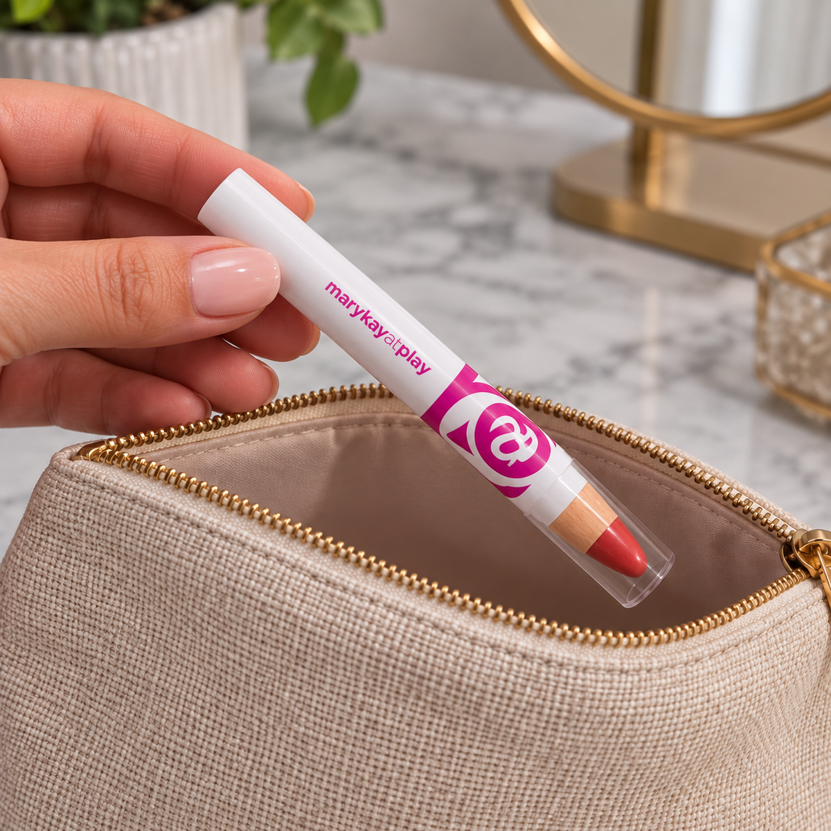 A capped Mary Kay At Play lip crayon being packed in a cosmetic pouch