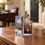 AI-generated room context: one Baldwin chrome hinge on a home-office sideboard; furniture and setting props are not included.