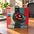 AI-generated scene of the same single BIconic Retro Style LED Speaker carton on a home-office desk.