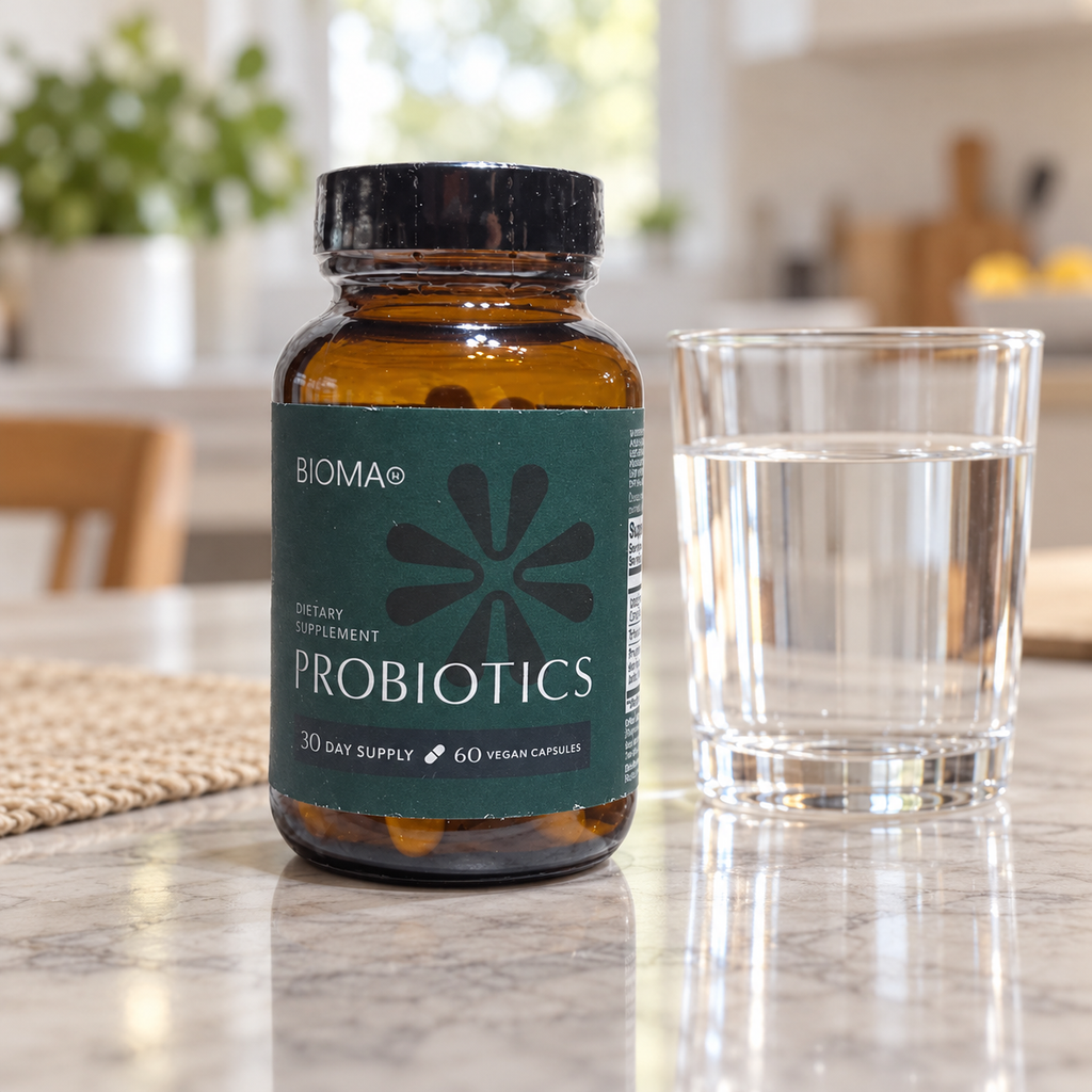 AI-generated lifestyle illustration of one matching teal-label BIOMA Probiotics 60-vegan-capsule bottle on a dining table beside water; props excluded.