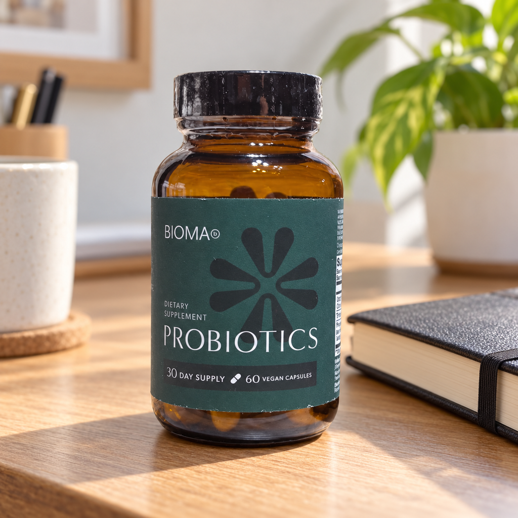 AI-generated lifestyle illustration of one matching teal-label BIOMA Probiotics 60-vegan-capsule bottle on a home-office desk; props excluded.
