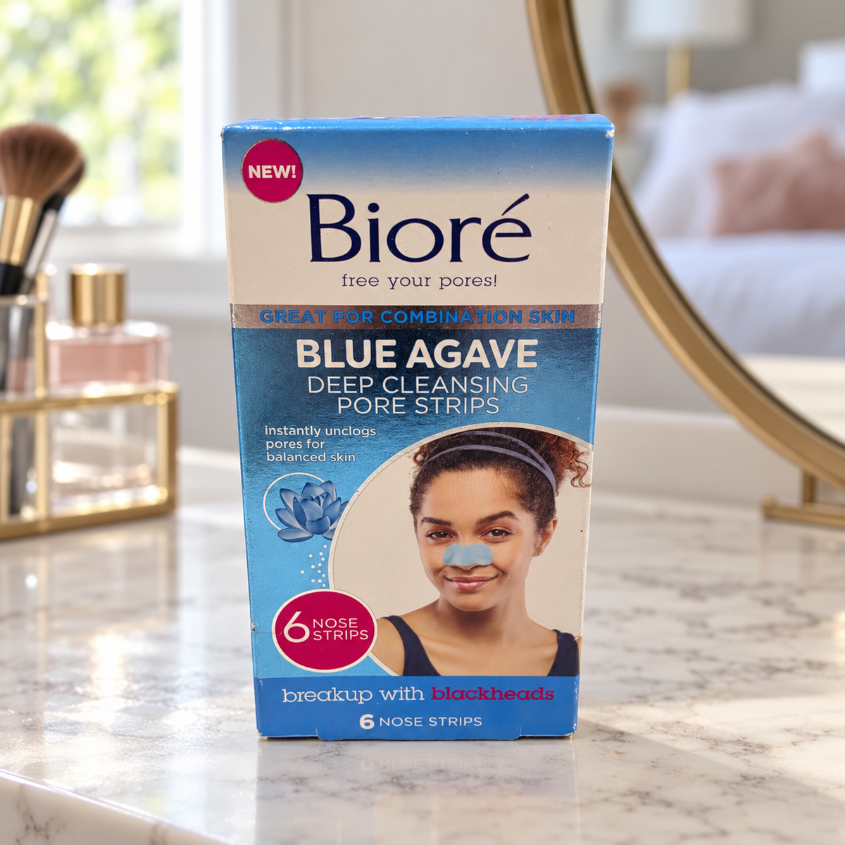 AI-generated lifestyle illustration of one matching Bioré Blue Agave 6-nose-strip retail box in a bedroom dressing table; props excluded.
