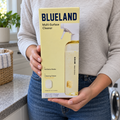 Blueland Multi-Surface Cleaner starter-set carton held with both hands