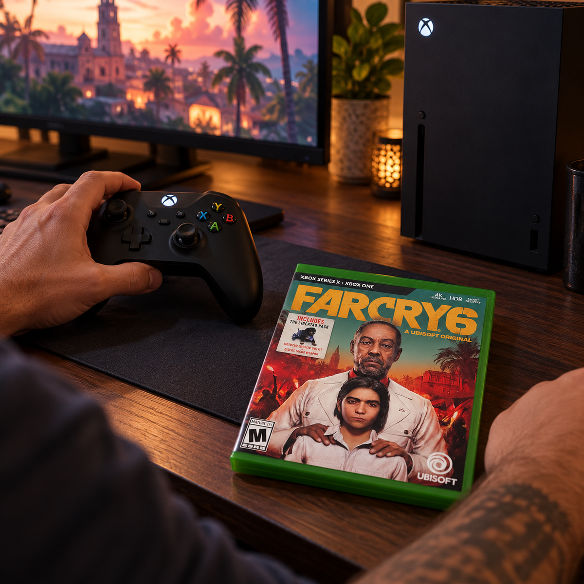 Reaching for an Xbox controller beside the Far Cry 6 game case