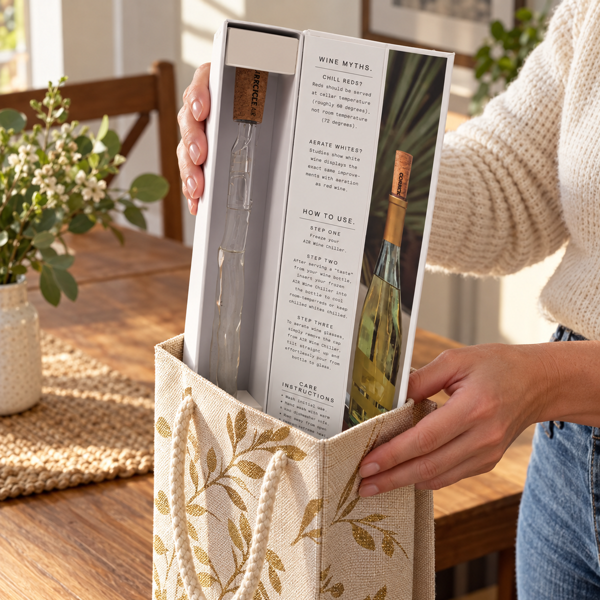Corkcicle Air in its retail display box being packed in a gift bag