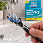 Rinsing a Mach3 cartridge under running water above a bathroom sink